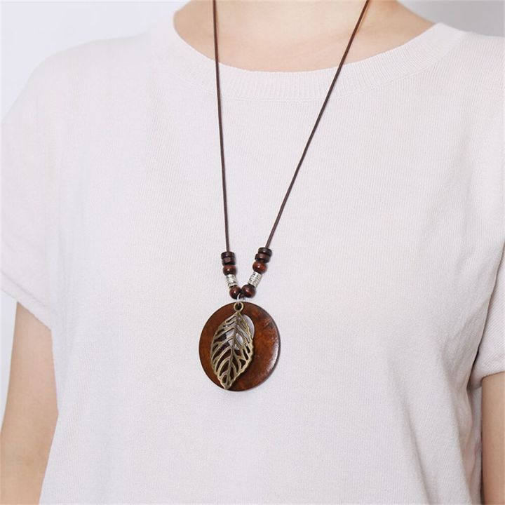 jdy6h-handmade-metal-hollow-owl-leaf-charms-necklace-women-brown-long-wax-rope-sweater-necklaces-with-wood-pendant