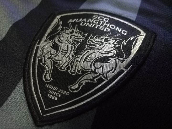 เสื้อฟุตบอลของแท้-สโมสร-เอสซีจี-เมืองทอง-ยูไนเต็ด-เจ-ชนาธิป-สรงกระสินธ์-18-ฟูลออฟชั่น-สีดำ-ของใหม่-ป้ายห้อย-2017-เสื้อกีฬา-กิเลนผยอง
