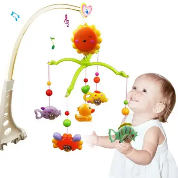 Baby bed clearance with hanging toys