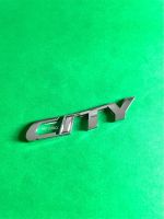 โลโก้ CITY ขนาด 9.3x1.5cm.