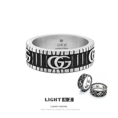 LIGHT &amp; Z แหวนเหล็กไทเทเนียมขนาดเล็กเดซี่แกะสลัก S925แหวนเงินไทยย้อนยุคกลวงแฟชั่นผู้ชายและผู้หญิงฝังแหวนคู่สีเขียวขุ่น