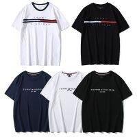 เท่านั้น♨Tommy Hilfiger เสื้อยืดคอกลมแขนสั้นของผู้ชาย,ฤดูร้อนคลาสสิคพกพาสามใบแบบเรียบง่ายสีล้วนแบบเรียบง่ายเสื้อทีเชิ้ตผู้ชายคอกลมผ้าฝ้ายหลวมคู่รักเสื้อข้ามพรมแดนสำหรับการค้าต่างประเทศ