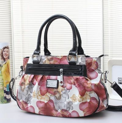 Middle-aged mother female 2021 new fashion handbag soft leather large capacity of leisure female package one shoulder inclined shoulder bag