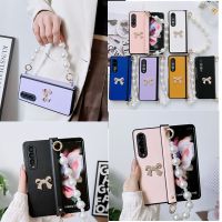 ?แฟชั่นหรูหรา CSCR DIY โบว์บานพับเคสหนังโซ่สร้อยข้อมือไข่มุกสำหรับ Samsung Galaxy Z Z Fold4เคส5G Z ฝาครอบ Fold3 Z พับได้4 3หยดและกล่องกันกระแทก