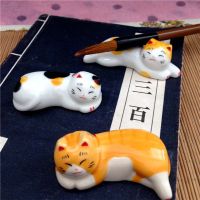 หมอนตะเกียบที่ใช้ในครัวเรือนตะเกียบอุปกรณ์บนโต๊ะอาหารจีนที่วางปากกาที่วางตะเกียบรูปแมว