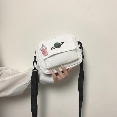 กระเป๋าสะพายไหล่กระเป๋านักเรียนทรงแมสเซ็นเจอร์กระเป๋าผ้าใบดาวเคราะห์แฟชั่นสำหรับผู้หญิงดวง