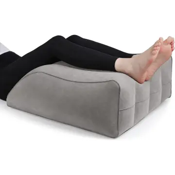 Elevated foot outlet pillow