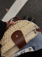 Uniqlo New Fashion version Pastoral style woven bag womens 2023 new saddle bag seaside vacation straw woven bag beach bag shoulder Messenger bag