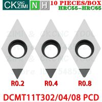 10ชิ้น DCMT11T302 DCMT11T304 PCD DCMT11T308 PCD แทรกเม็ดมีดเพชรการหมุนเครื่องกลึงเกลียวการตัดเครื่องมือกลึง CNC DCMT 11