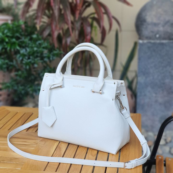 Charles & Keith launched an accessories collection for strong women, led by  Hailey Bieber and Xiao Wen Ju - Fashion Journal