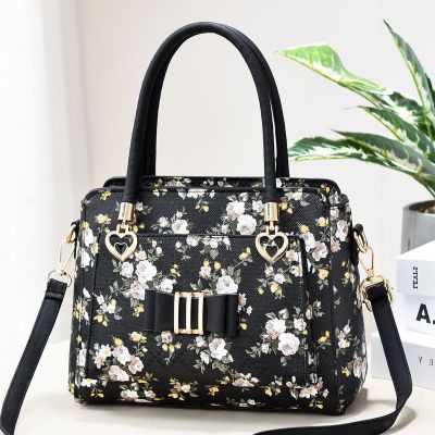 Bag lady in the summer of 2021 the new tide of large capacity fashion printed his mother BaoChun bowknot middle-aged female bag
