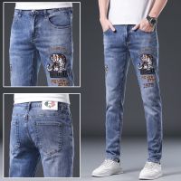 Jeans Slim Fit ผู้ชายทรงสลิมฟิตปักลายเสือแนวยุโรปใหม่