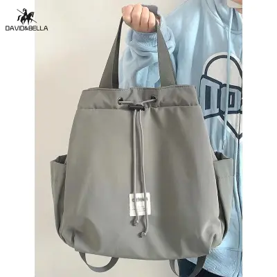 Deere Jack กระเป๋าถือคอมมิวเตอร์แฟชั่นสไตล์เกาหลีสำหรับผู้หญิง,กระเป๋านักเรียนกระเป๋านักเรียนเข้าได้ทุกชุดแบบลำลองกระเป๋าเป้สะพายหลังขนาดใหญ่ใหม่