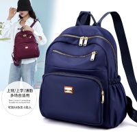 [COD] female 2022 spring new large-capacity simple ladies backpack nylon cloth light student schoolbag travel bag