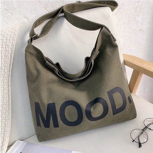 koreafashionshop-kr1813-กระเป๋าผ้าสะพายข้าง-mood-ผ้าแคนวาส-ผู้ชาย-ผู้หญิง-อินเทรนด์-ญี่ปุ่น-มี3สี