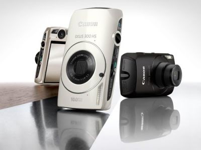 กล้องcanon ixus 300 hs ระบบทำงานอัตโนมัติและออโต้โฟกัส เลนส์ซูม 4.9-18.6 มม. 3.8เท่า กันสั่นไหว ถ่ายย้อนแสง ถ่ายไฟ และสปอร์ตโหมด แบ็ตชาร์จ lithium ion