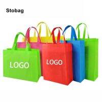 Stobag 10ชิ้นกระเป๋าผ้าช็อปปิ้งลดโลกร้อนใยสังเคราะห์สีกระเป๋าผ้านำมาใช้ใหม่ได้พร้อมที่จับของขวัญกระเป๋าเก็บของโลโก้ที่กำหนดเอง