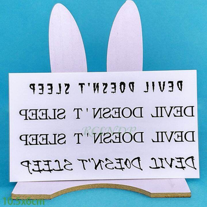 สติกเกอร์รอยสักชั่วคราวกันน้ำสีดำปีศาจไม่หลับรอยสักแบบด่วนตัวอักษรภาษาอังกฤษรอยสักปลอมข้อมือคอสำหรับผู้หญิงผู้ชาย