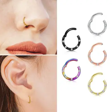 Side face female with ear ring images Stock Photos - Page 1 : Masterfile