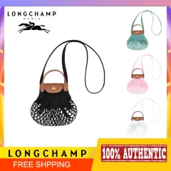 JL Penha - Épure Bucket bag by Longchamp, is a mix of a basket and a beach  bucket, has a press stud and a short handle for on-trend hand carry. In  durable