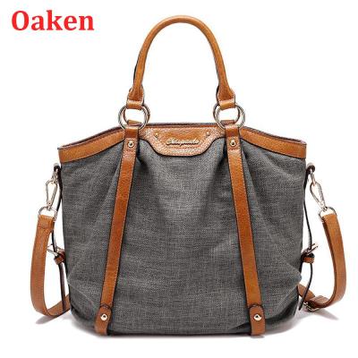 กระเป๋าสุภาพสตรี Oaken ผ้าใบความจุขนาดใหญ่เดินทางกระเป๋าถือสลักรูปสายคล้องไหล่ (30*14*30ซม.)