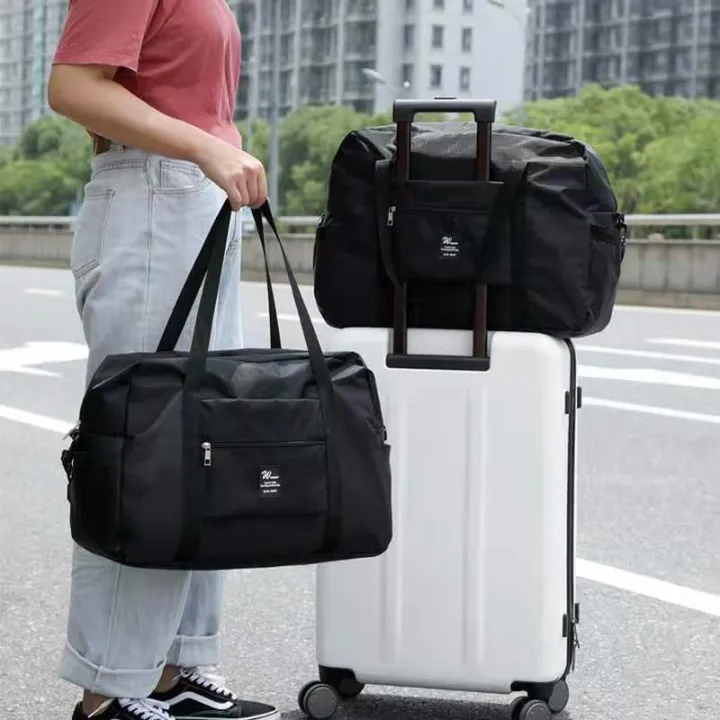 กระเป๋าเดินทาง-กระเป๋าใส่ของเสริม-กระเป๋าพับได้-กระเป๋าผ้าร่มกันเปียกน้ำ