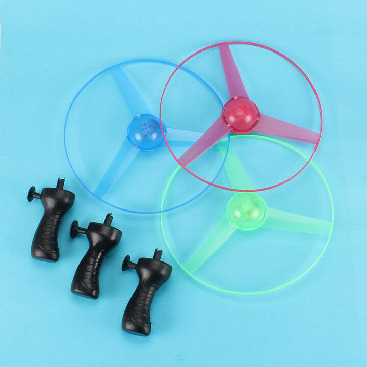 funny-spinning-flyer-luminous-flying-ufo-led-light-handle-flash-flying-ของเล่นสำหรับเด็กเกมกลางแจ้งสีสุ่ม