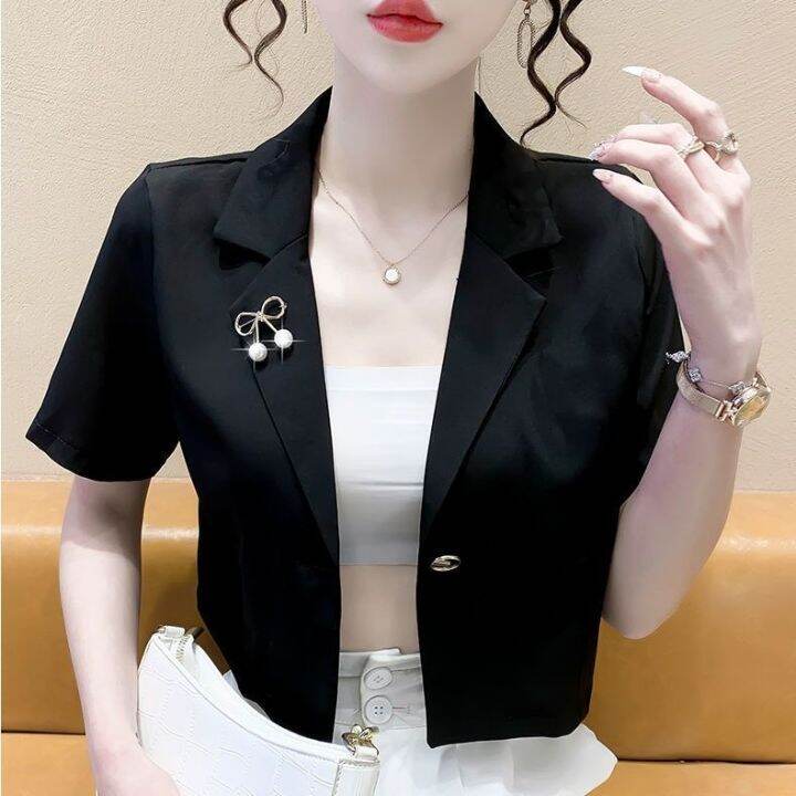 Xu hướng áo Vest không tay cho mùa hè - Xu hướng - ELLE.vn