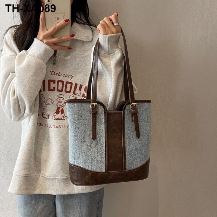 กระเป๋าโท้ทยีนส์ผู้หญิง-2023-ใหม่อินเทรนด์เกาหลีกระเป๋าใต้วงแขนเนื้อเฉพาะกระเป๋าสะพายถังความจุขนาดใหญ่