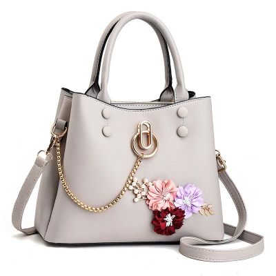 Female bag in the summer of 2021 new fashionable han edition hand the bill of lading shoulder aslant sequins handbag bags across borders