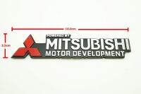 ป้ายโลโก้โลหะ POWER BY MITSUBISHI MOTOR DEVELOPMENT ขนาด 16.0X3.5 cm ติดตั้งด้วยเทปกาวสองหน้าด้านหลัง