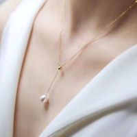 Necklace สร้อยคอยาวพู่ไข่มุกเดี่ยวแบบเรียบง่าย,อุปกรณ์เสริมเสื้อผ้าทำจากมุกสีทองปรับความยาวได้