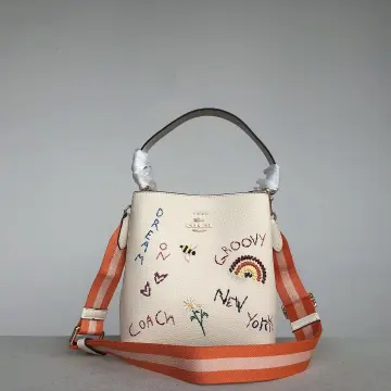 SOLD Coach Small Town Bucket Bag Dandelion Floral  Black leather handbags,  Beige handbags, Floral purse