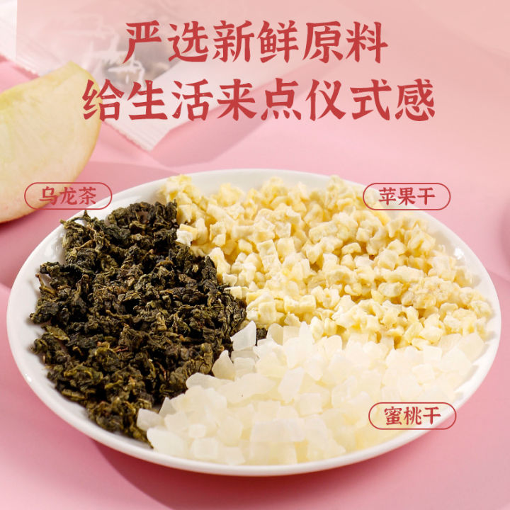 ดอกชาอูหลงลูกพีชน้ำผึ้งชาผลไม้ทรงสามเหลี่ยมดอกไม้ห่อชาเพื่อสุขภาพชาสีขาวพีชใส่ใบชาแช่เย็นชาอูหลง