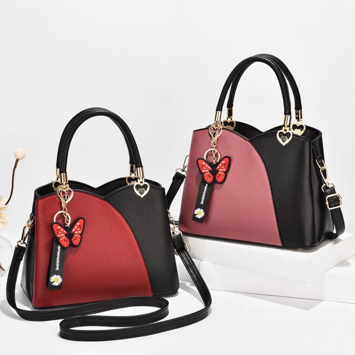 female-bag-2021-new-fashionable-color-matching-handbag-high-capacity-butterfly-pendant-middle-aged-female-bag-shoulder-inclined-shoulder-bag