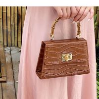 Hot selling gardenia self-made new leather bamboo hand-held cross-body retro womens bag all-match chain mini square art