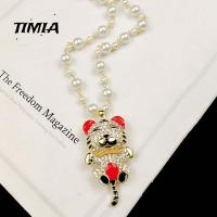 TIMIA หวาน ของขวัญวันเกิด กอธิค Rhinestone เพชร สีทอง ไข่มุก โซ่โลหะ สร้อยคอผู้หญิง สร้อยคอจี้เสือ เครื่องประดับเสื้อกันหนาว โซ่กระดูกไหปลาร้า