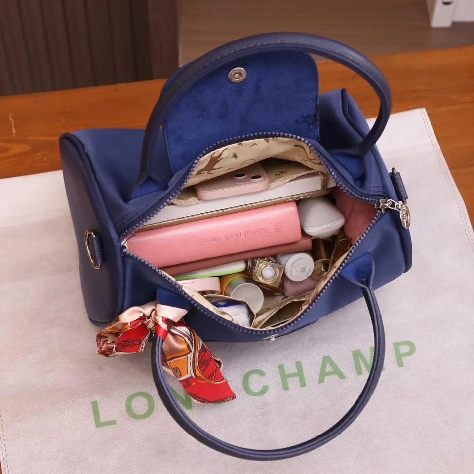 BEG TANGAN LONGCHAMP.