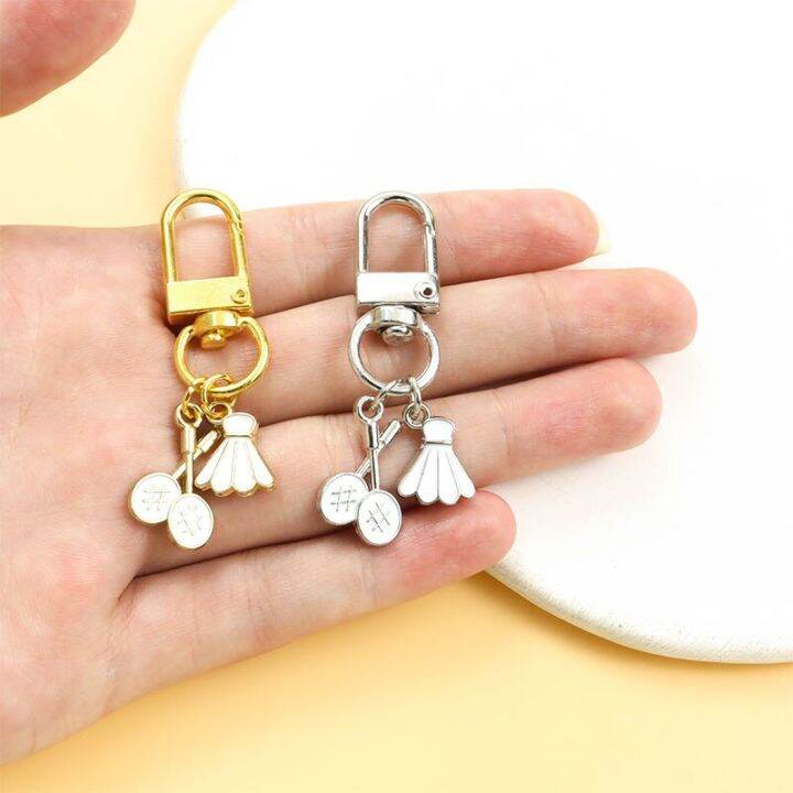 cute-enamel-keychains-cartoon-badminton-racket-drip-oil-charms-pendants-key-rings-for-women-man-bags-earphone-case-jewelry-gifts