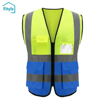 Premium Photo | Close up of engineer young man wearing safety vest and  holding helmet on building construction site background engineering  construction worker concept