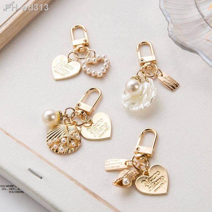 luxury-artificial-pearl-keychain-metal-peach-heart-pendant-keyring-women-fashion-headphone-case-charm-bag-jewelry-accessories