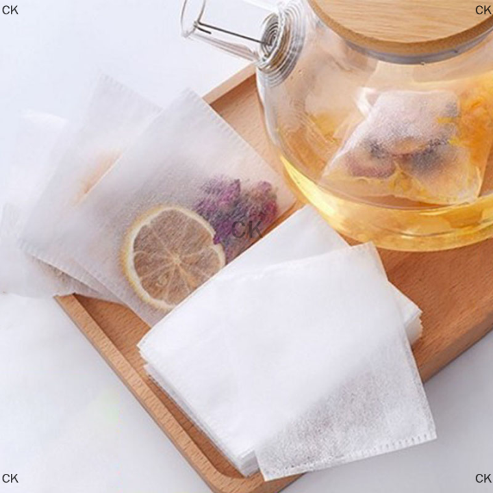 ck-100pcs-non-woven-disposable-empty-teabag-filter-herb-tea-strainer-supply