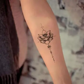 Ganesh And Lotus Flower Calf Tattoo  Adorned Tattoo