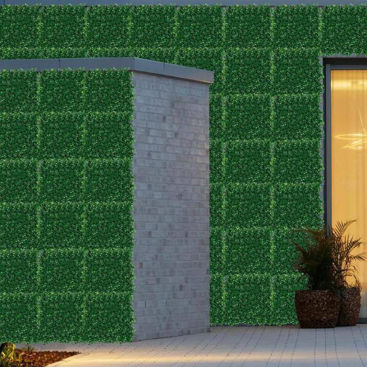 10ชิ้นกำแพงหญ้าเทียมใบเทียมเหมือนจริงแผงผนังหญ้าเทียมบ็อกวู้ดผนังหญ้าเทียมของประดิษฐ์ที่สมจริง