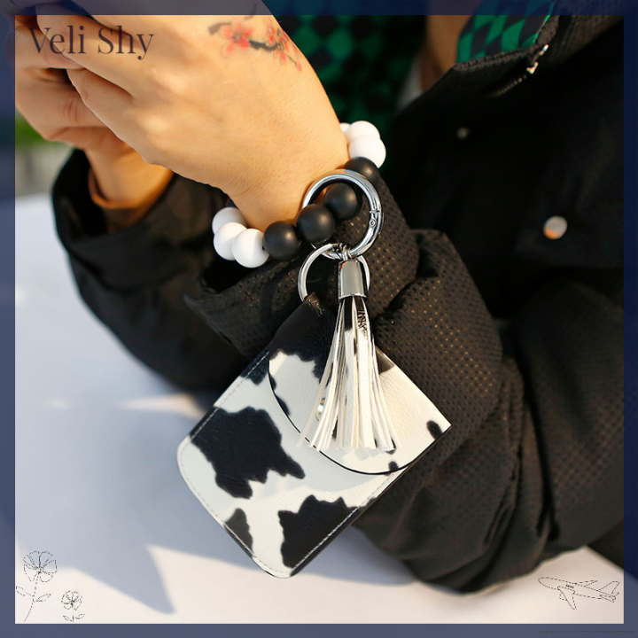 veli-shy-พวงกุญแจสร้อยข้อมือลูกปัดคล้องข้อมือซิลิโคน-เคสหนังกำไลข้อมือพู่ห้อยสำหรับกระเป๋าเก็บบัตร