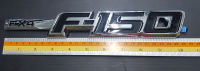 Logo Fx4 F 150 มีพร้อมกาวติด ขนาดประมาณ 27*4 cm ของรถ Ford เงิน ดำ