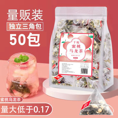 ดอกชาอูหลงลูกพีชน้ำผึ้งชาผลไม้ทรงสามเหลี่ยมดอกไม้ห่อชาเพื่อสุขภาพชาสีขาวพีชใส่ใบชาแช่เย็นชาอูหลง