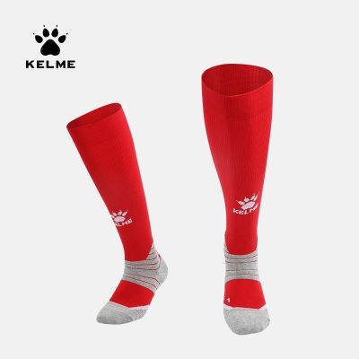 KELME Carl ถุงเท้าฟุตบอลสวยงามของผู้ชายและผู้หญิงพร้อมถุงเท้ากันลื่นด้านล่างผ้าเช็ดตัวหนาถุงเท้ากีฬาฝึกซ้อมแบบใหม่ดั้งเดิม