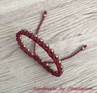 สร้อยข้อมือเชือกเทียนถัก Macrame สีชมพูบานเย็น