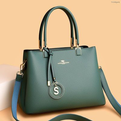 👜handbag branded กระเป๋าถือแม่วัยกลางคนสีทึบใหม่ความจุขนาดใหญ่สีทึบเทรนด์สบาย ๆ กระเป๋าสะพายสุภาพสตรีย้อนยุคยุโรปและอเมริกา